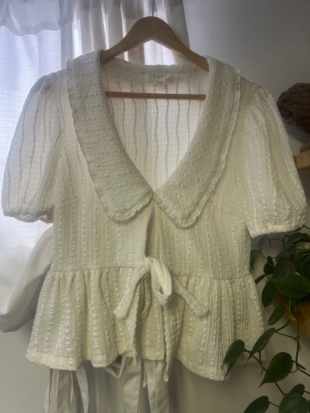 Cream Textured Peplum Tie-Front Top